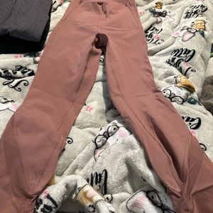 Size 0 lulu lemon crop light pink leggings new worn maybe once doesn’t have tags